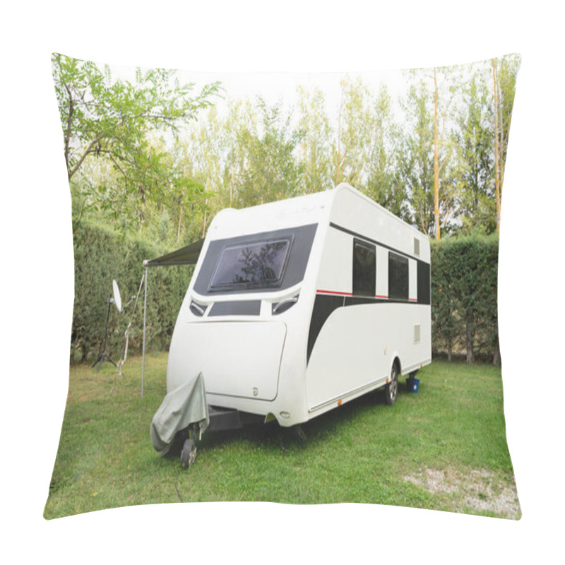 Personality  A White Trailer,a Motorhome For Travel,a Motorhome,camper,trailer Without A Car Against A Background Of Beautiful Bushes Stands On Short Green Lawn Grass.Technologies Of Transport, Means Of Travel. Pillow Covers