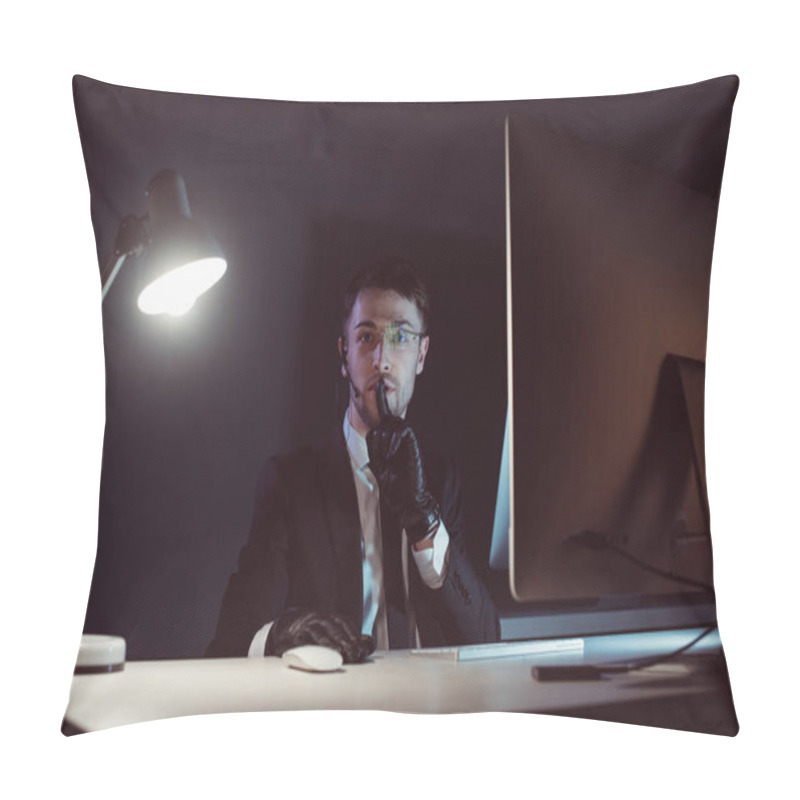 Personality  Portrait Of Spy Agent Showing Silence Sign At Table With Computer Screen In Dark Pillow Covers