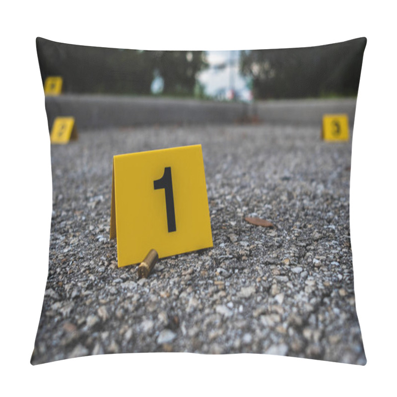 Personality  A Group Of Yellow Crime Scene Evidence Markers On The Street After A Gun Shooting Brass Bullet Shell Casing Rifle Pillow Covers