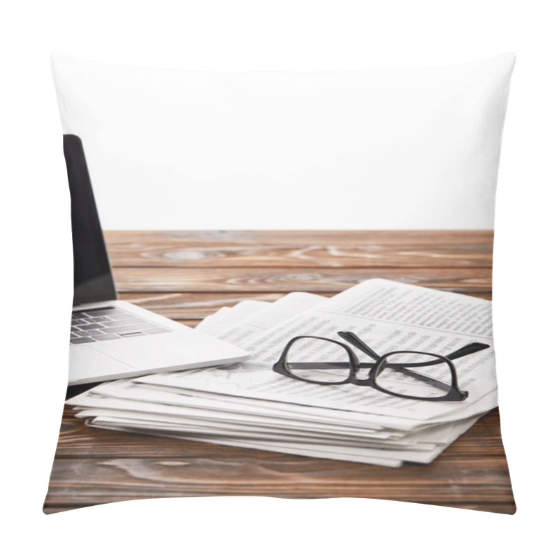 Personality  Eyewear On Pile Of Newspapers And Laptop On Wooden Table, On White Pillow Covers