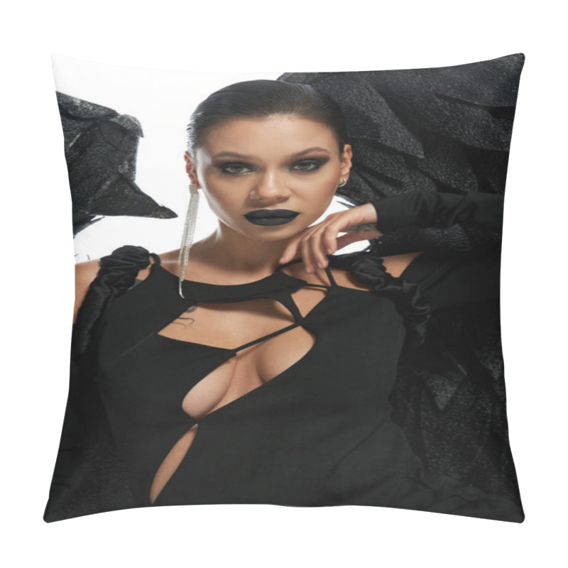 Personality  Portrait Of Sexy Woman In Dark Makeup And Costume Of Black Winged Demon Looking At Camera On White Pillow Covers