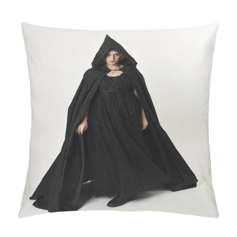 Personality  Full Length Portrait Of Blonde Girl Wearing Long Black Flowing Cloak, Standing Pose  With  A White Studio Background. Pillow Covers