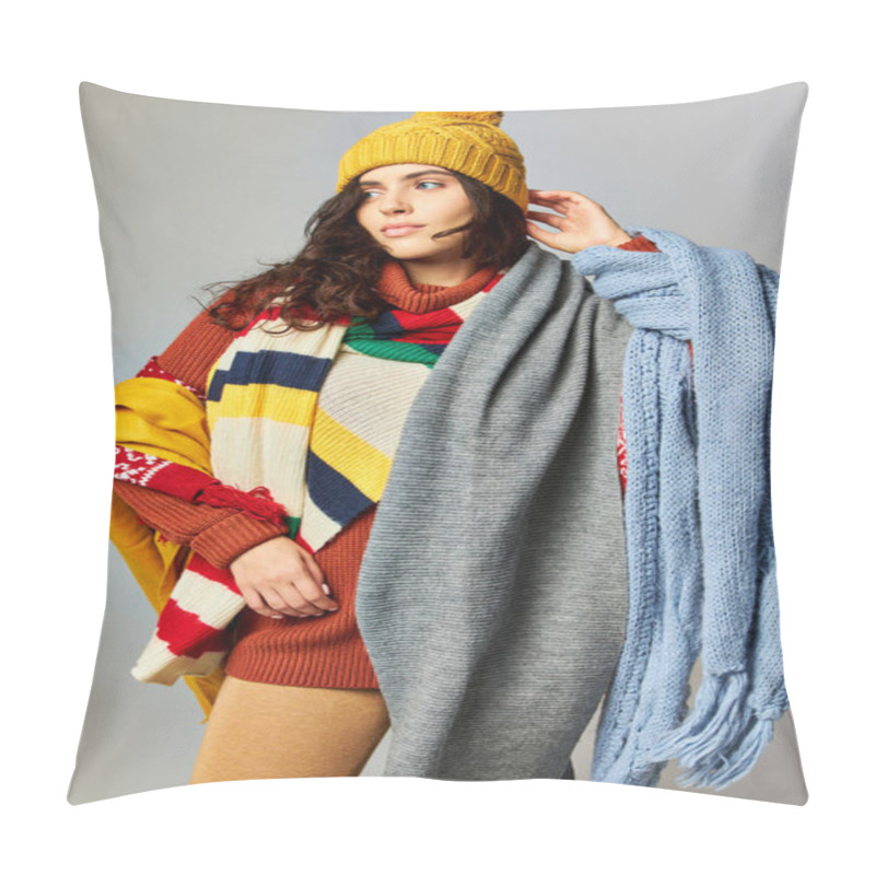 Personality  Brunette Woman With Curly Hair In Bobble Hat And Cozy Sweater Posing With Scarfs On Grey Backdrop Pillow Covers