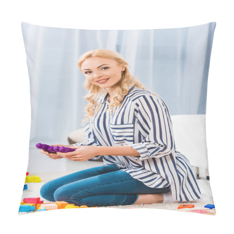 Personality  Side View Of Young Mother With Toys Sitting On Floor At Home Pillow Covers