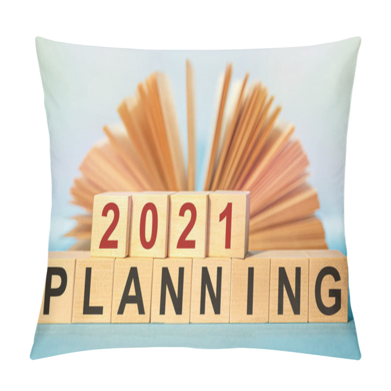 Personality  Wooden Cubes With The Abbreviation 2021 PLANNING On The Background Of An Open Book. Pillow Covers