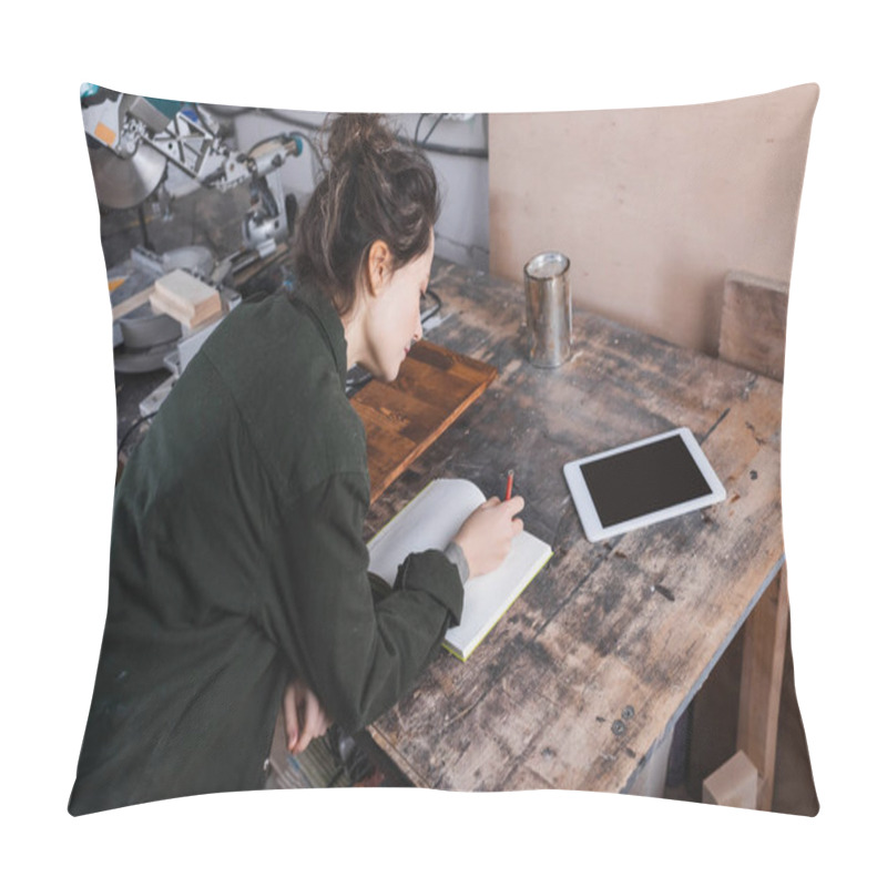 Personality  High Angle View Of Carpenter Writing On Notebook Near Digital Tablet And Wood Stain In Workshop  Pillow Covers