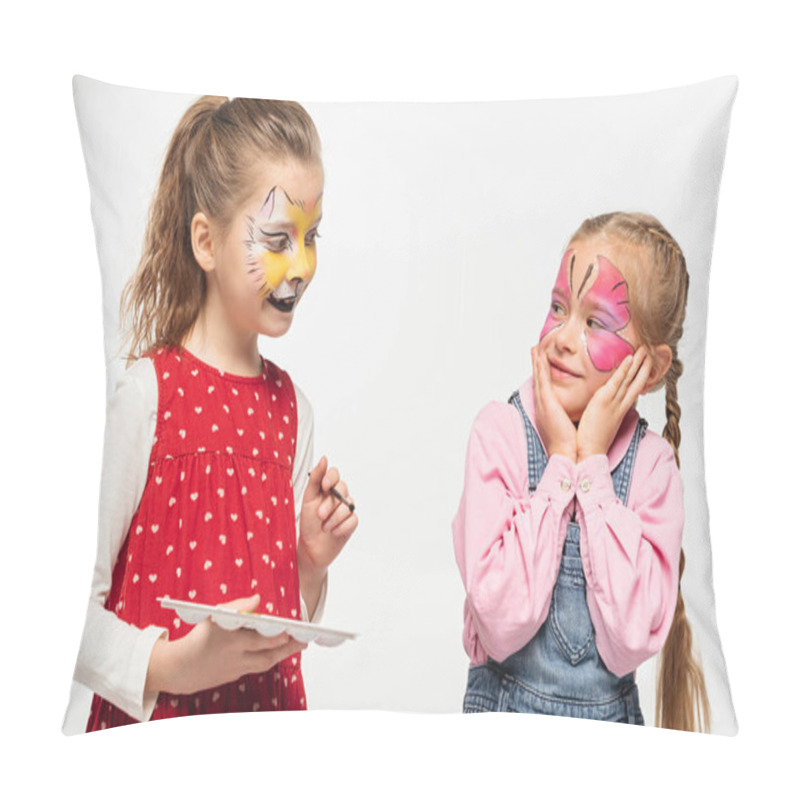 Personality  Cute Child With Cat Muzzle Painting On Face Holding Palette And Paintbrush Near Amused Friend With Painted Butterfly Mask Isolated On White Pillow Covers