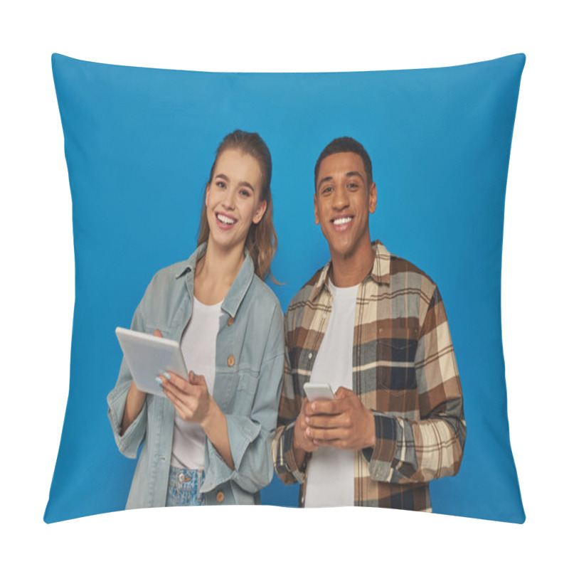 Personality  Happy Multiethnic Couple Holding Smartphone And Digital Tablet On Blue Backdrop, Look At Camera Pillow Covers