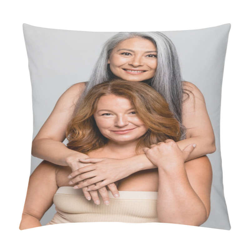 Personality  Smiling Asian Woman Hugging Friend In Bra And Looking At Camera Isolated On Grey Pillow Covers