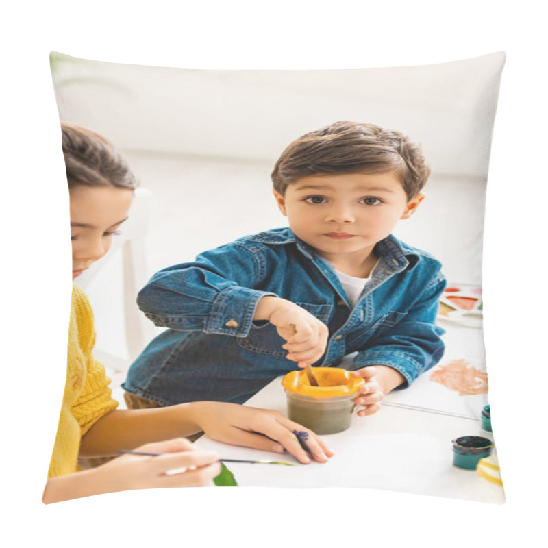 Personality  Adorable Boy Mixing Paints In Container While Sitting Near Sister And Looking At Camera Pillow Covers