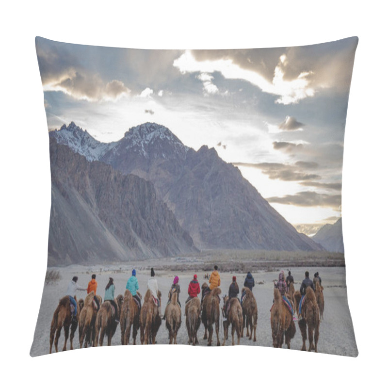 Personality  Nubra Valley,Jammu And Kashmir, Ladakh Region, Tibet, India - April 2019 : Unidentified Group Of Tourists With Herd Of Bactrian Camels During Riding Camels Day Trip Program With Sunset Scene. Pillow Covers