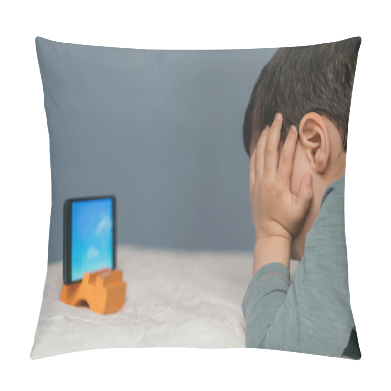 Personality  Little Boy Touching Head While Watching Educational Cartoon On Smartphone While Lying On Bed Pillow Covers