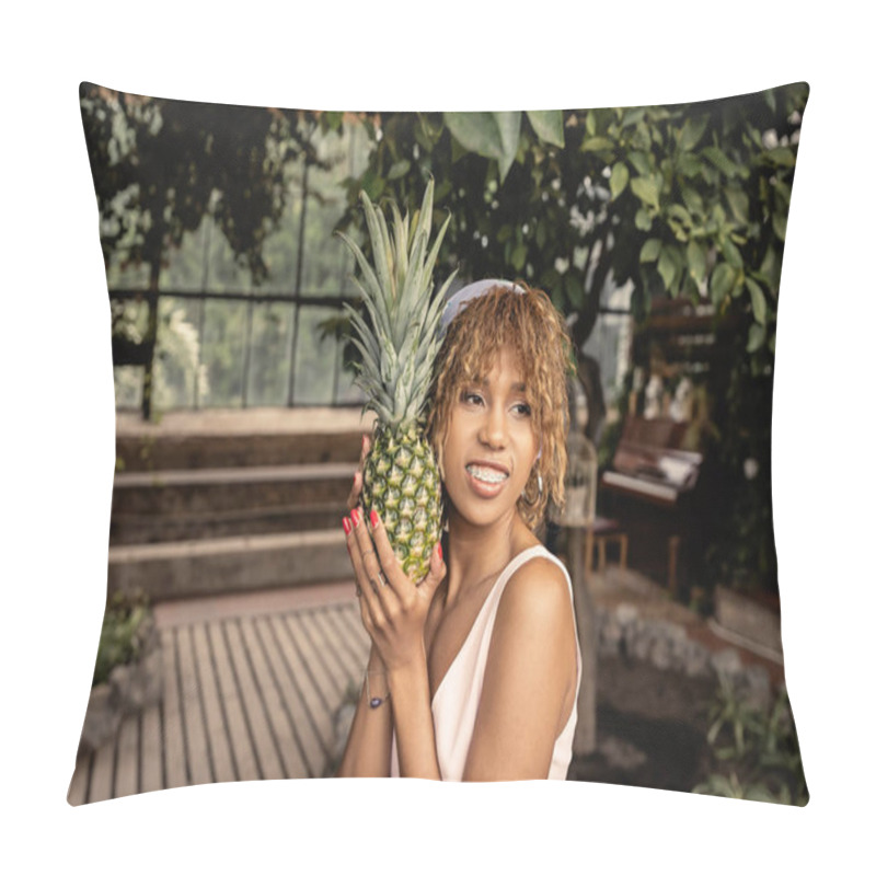 Personality  Pleased African American Woman With Braces And Summer Outfit Holding Fresh Pineapple And Standing In Garden Center, Stylish Woman Wearing Summer Outfit Surrounded By Tropical Foliage Pillow Covers