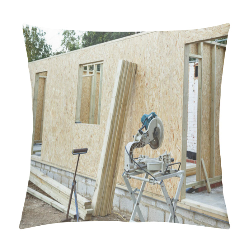 Personality  A Timber Frame House Is Constructed Using OSB Sheets To Form Timber Panels. Carpenter's Chop Saw In The Foreground Pillow Covers