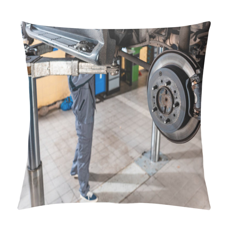 Personality  Selective Focus Of Assembled Disc Brakes Near Young Mechanic Examining Raised Car Pillow Covers