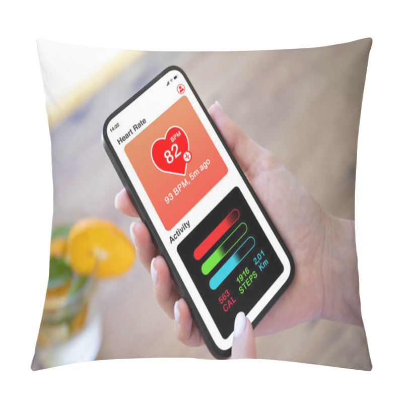 Personality  Woman Hand Hold Phone With App Heart And Activity On Screen Background Of Orange Lemonade In Cafe Pillow Covers