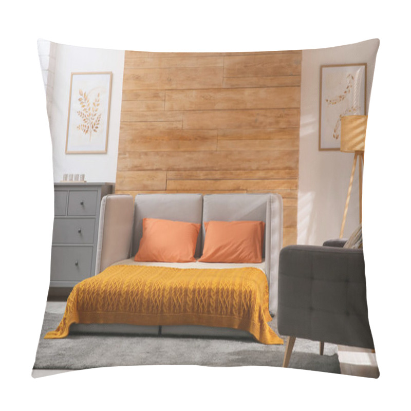 Personality  Room Interior With Sofa Unfolded Into Bed Near Wooden Wall Pillow Covers