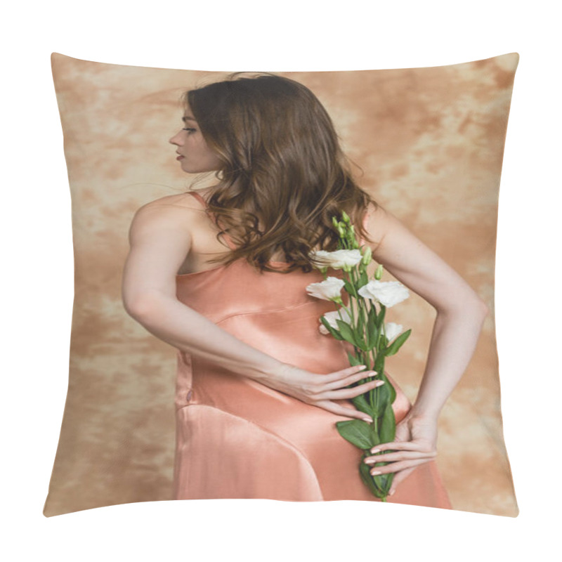 Personality  Back View Of Graceful Young Woman With Brunette Hair Standing In Silk Slip Dress And Holding White Flowers Behind Back On Mottled Beige Background, Sensuality, Elegance, Looking Away  Pillow Covers