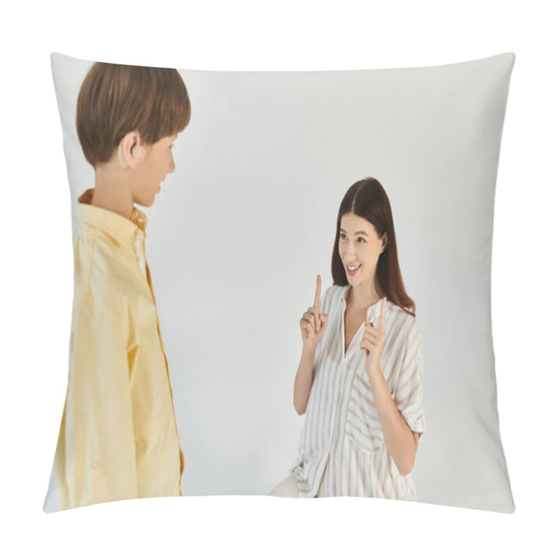 Personality  A Devoted Mother Teaches Her Hearing Impaired Son With Enthusiasm And Love In A Warm Environment. Pillow Covers