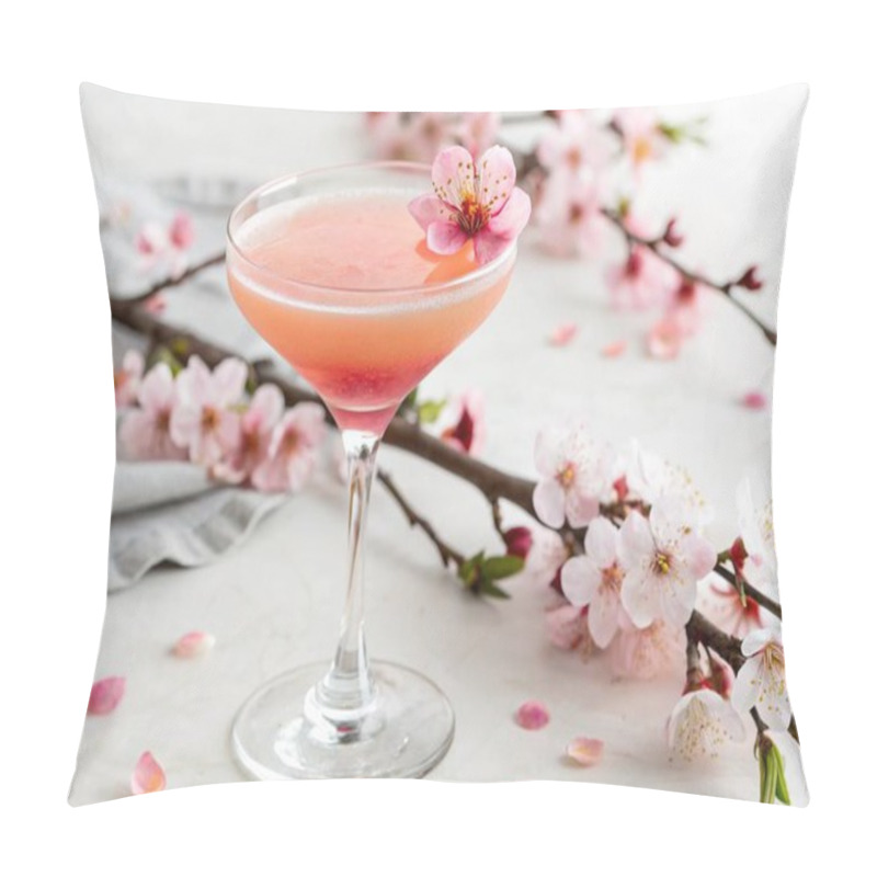 Personality  A Photo Featuring A Delicate Cocktail Drink With A Pinkish-orange Hue, A Delicate Flower Atop The Drink, And A Backdrop Of Delicate Pink Cherry Blossom Branches. The Cocktail Is Served In A Stemmed Glass And Is The Central Focus Of The Image. The Ima Pillow Covers