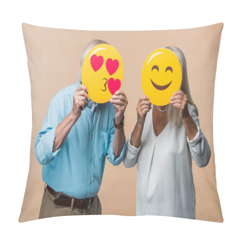 Personality  KYIV, UKRAINE - JUNE 14, 2019: Senior Couple Covering Faces With Yellow Smileys Isolated On Beige  Pillow Covers