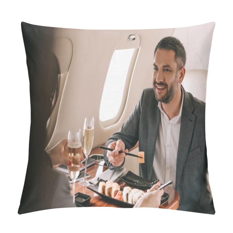 Personality  Cropped View Of Businesswoman Near Cheerful Businessman And Tasty Sushi In Private Jet Pillow Covers