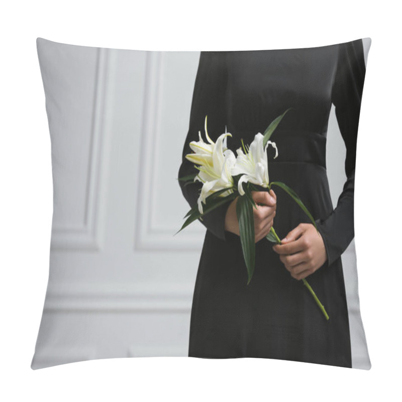 Personality  Woman With Lilies Near White Wall, Closeup And Space For Text. Funeral Ceremony Pillow Covers