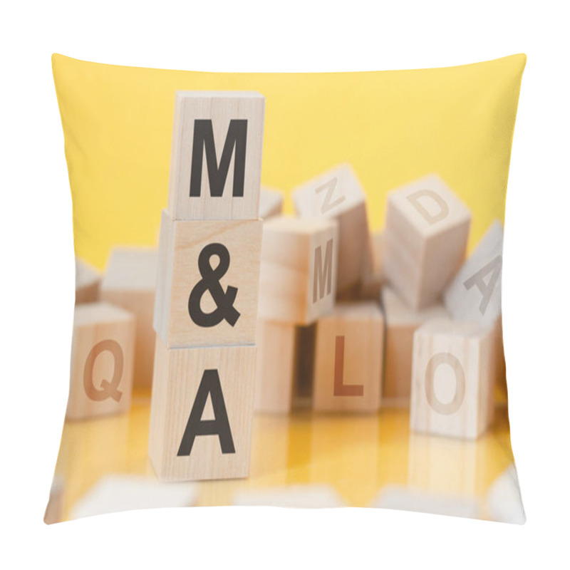 Personality  M And A - Short For Mergers And Acquisitions - Written On A Wooden Cube, Business Concept. Yellow Bacground. Can Be Used For Business, Marketing, Education, Financial Concept. Selective Focus. Pillow Covers