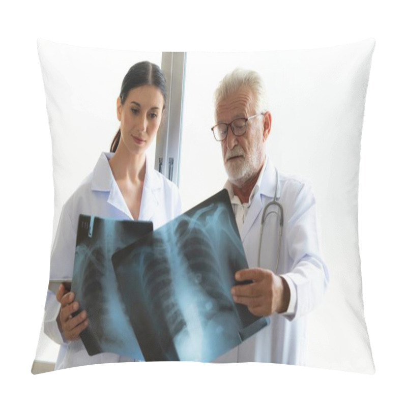 Personality  In A Hospital Sterile Room, Two Professional Radiographers Hold And Examine A Radiograph For Medical Xray Diagnosis. Novice Doctor Seeks Advice On A Patients Condition From Experienced Older Doctor. Pillow Covers