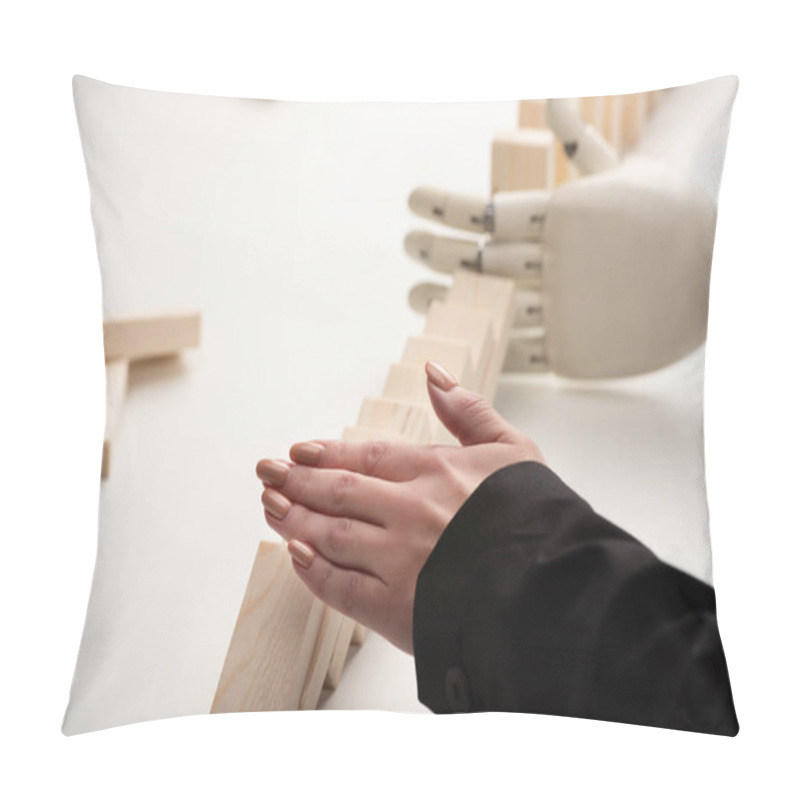 Personality  Partial View Of Woman Pushing Wooden Bricks While Robotic Hand Preventing Row From Falling Pillow Covers