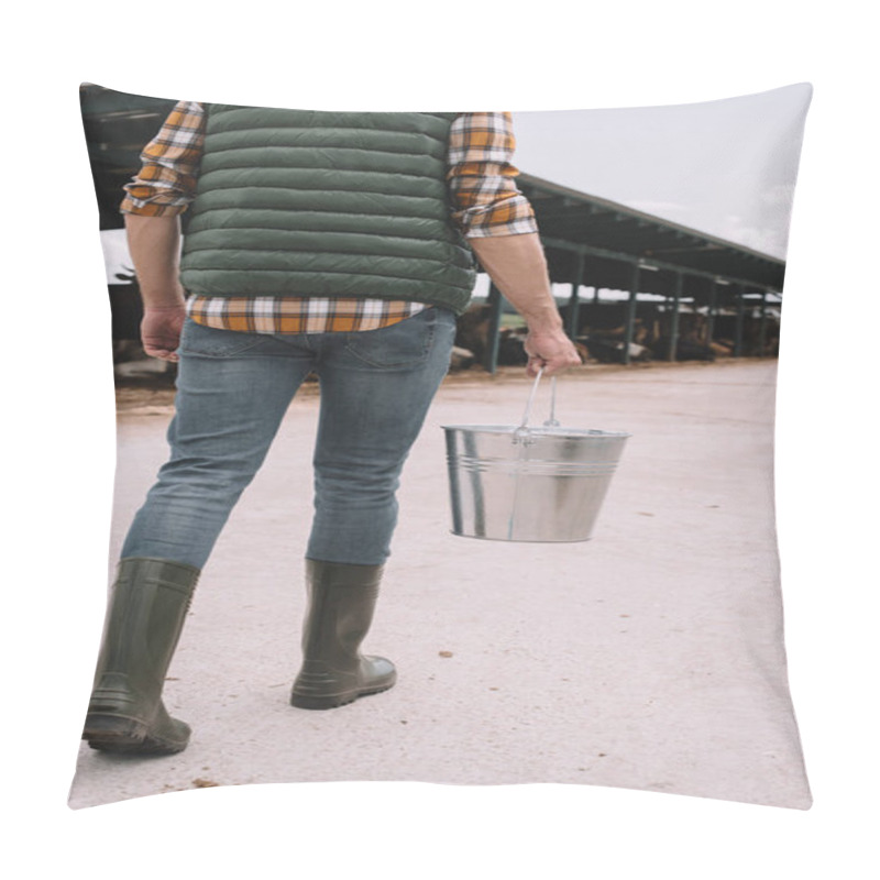 Personality  Cropped Shot Of Farmer In Rubber Boots Holding Bucket And Walking In Cowshed Pillow Covers