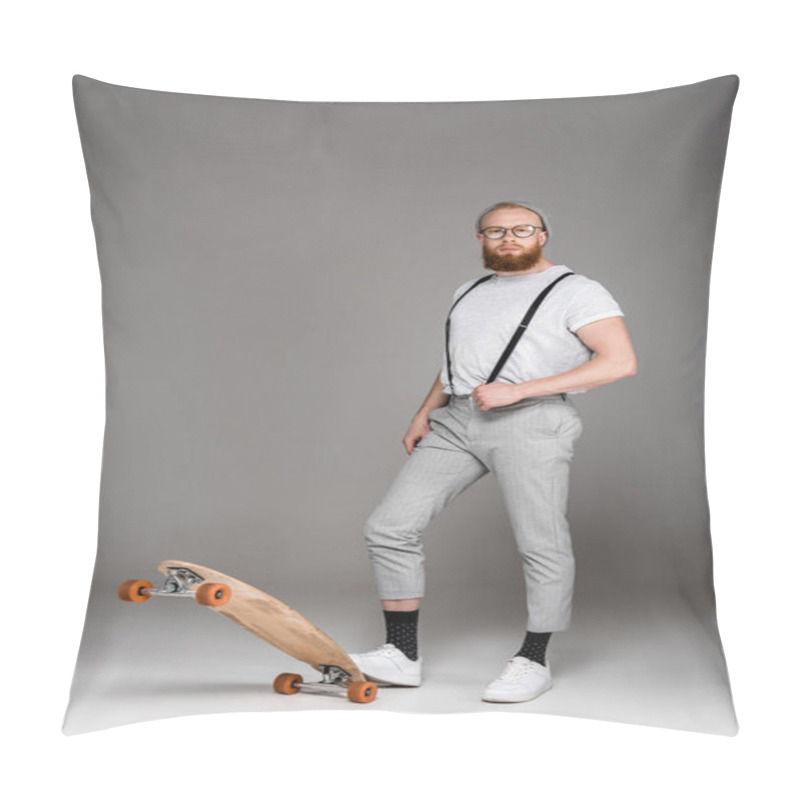 Personality  Stylish Bearded Man In Suspenders Standing With Skateboard And Looking At Camera On Grey Pillow Covers