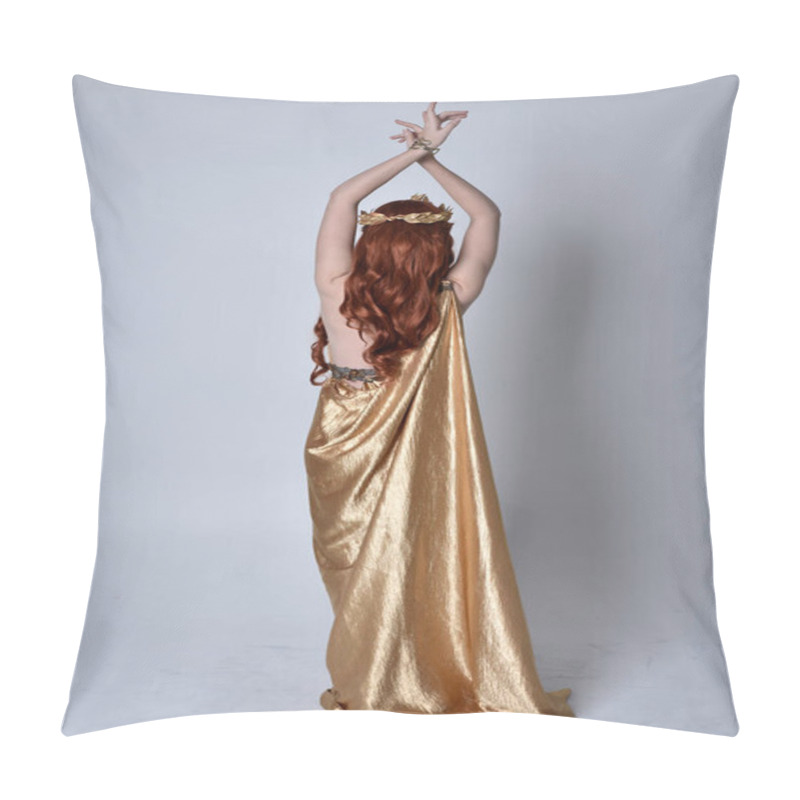 Personality  Full Length Portrait Of Girl With Red Hair Wearing Long Grecian Toga And Golden Wreath. Standing Pose With Back To The Camera,  Isolated Against A Grey Studio Background. Pillow Covers