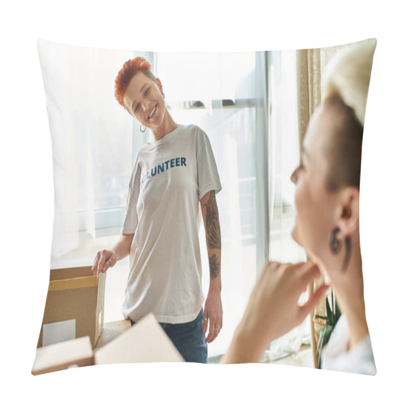 Personality  A Woman In A Volunteer T-shirt Smiles Next To A Box, Showing Her Support For A Charitable Cause. Pillow Covers