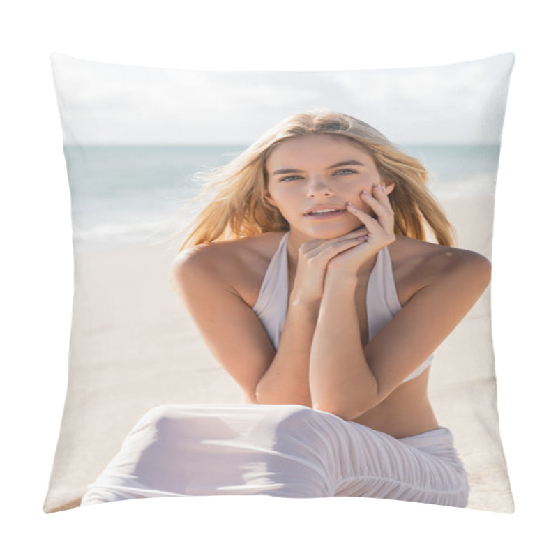 Personality  A Young Blonde Woman Strikes A Pose While Seated On The Sandy Shores Of Miami Beach, Exuding Serenity And Beauty. Pillow Covers