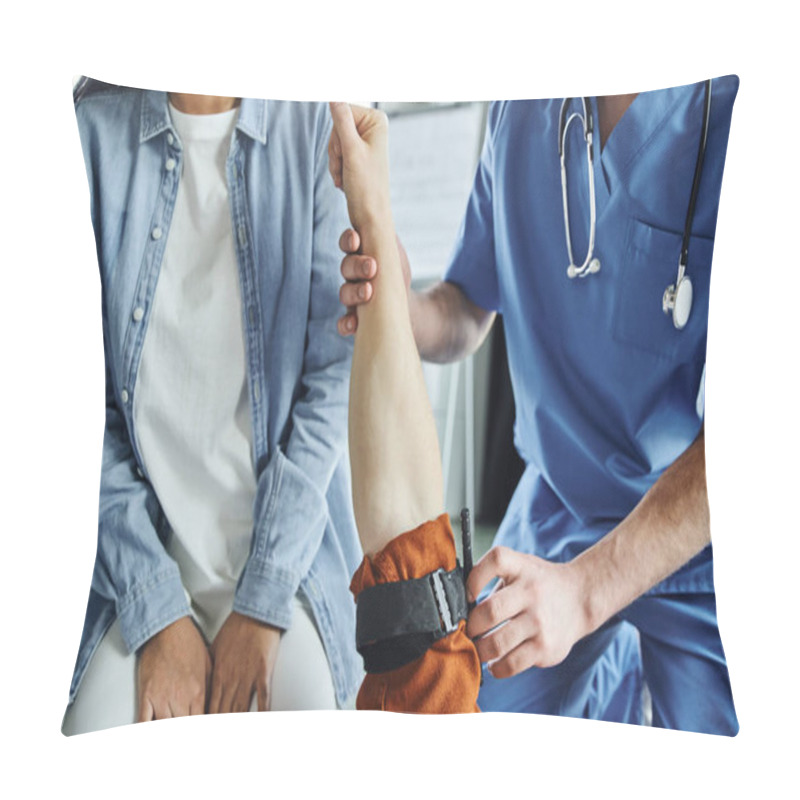 Personality  Cropped View Of Professional Paramedic Applying Compression Tourniquet On Arm Of Man Near Young Woman During First Aid Seminar In Training Room, Emergency Situations Response Concept Pillow Covers