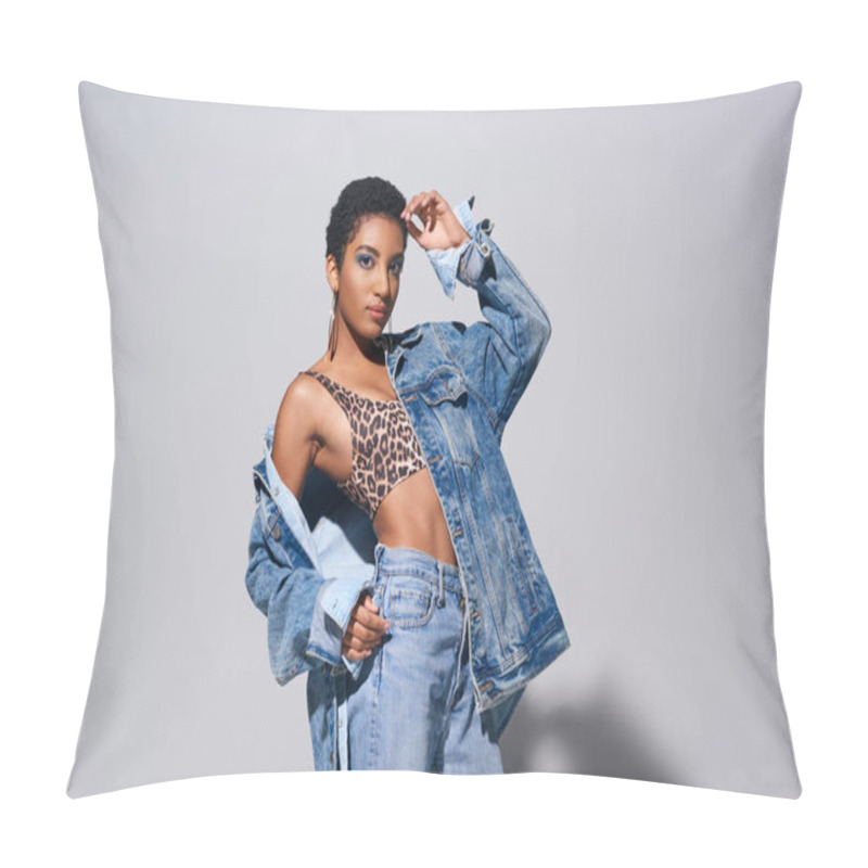 Personality  Confident Young African American Woman With Short Hair Posing In Top With Animal Print, Jeans And Denim Jacket While Standing On Grey Background, Denim Fashion Concept Pillow Covers