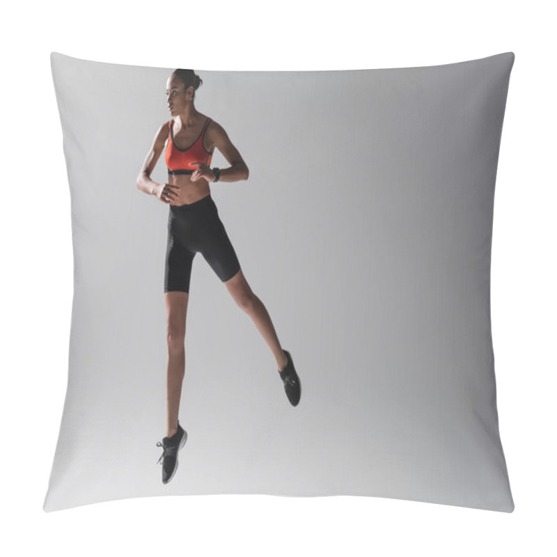 Personality  Full Length Of Tattooed African American Woman In Sports Bra And Shorts Jumping On Grey Background  Pillow Covers