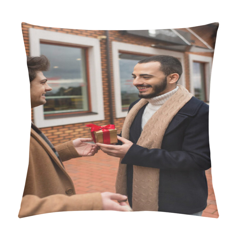 Personality  Young Gay Man Presenting Small Gift Box To Smiling Bearded Boyfriend Near Blurred Shop On Street Pillow Covers