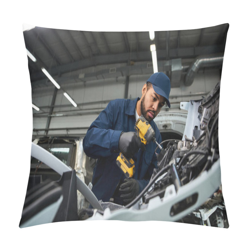 Personality  Handsome Young Mechanic Focuses On Repairing Vehicle Components In A Modern Garage Setting. Pillow Covers