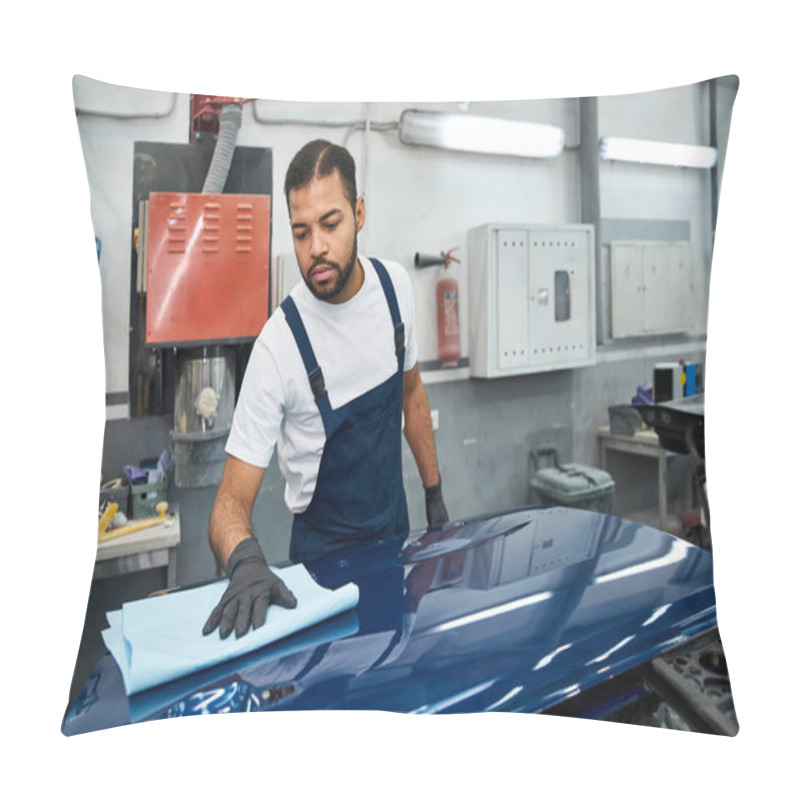 Personality  Young Mechanic Focuses On Cleaning A Car Hood With A Cloth In A Busy Repair Shop. Pillow Covers