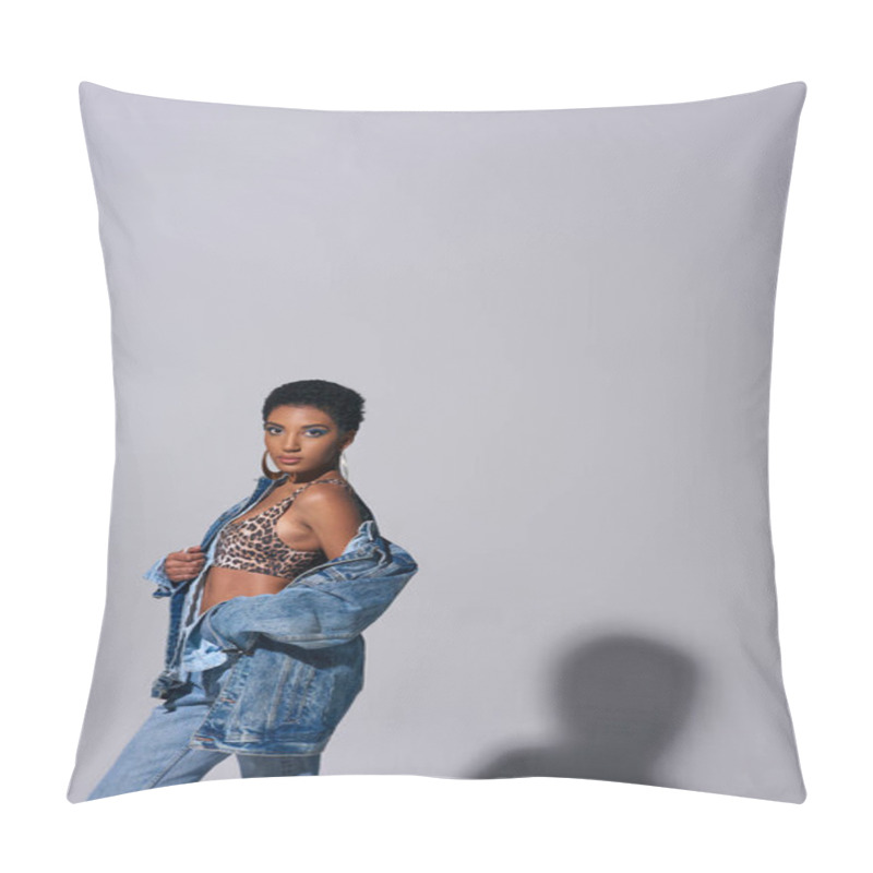 Personality  Fashionable African American Woman With Golden Earrings And Short Hair Posing In Top With Animal Print And Denim Jacket On Grey Background, Denim Fashion Concept Pillow Covers