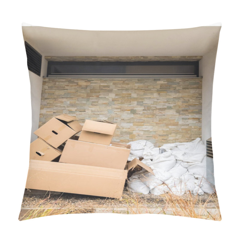 Personality  Discarded Cardboard Boxes And White Trash Bags Are Stacked Against A Modern Stone Wall In An Urban Setting. The Dry Grass In The Foreground Adds Contrast. Ready For Recycling Outside A Building Pillow Covers