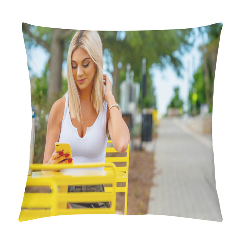 Personality  A Young Woman Strolls Her Quaint Town On A Lovely Spring Day, Phone In Hand. Surrounded By Blooming Flowers And Warm Sunlight, She Stays Connected, Blending Technology With The Charm Of Her Serene Surroundings Pillow Covers