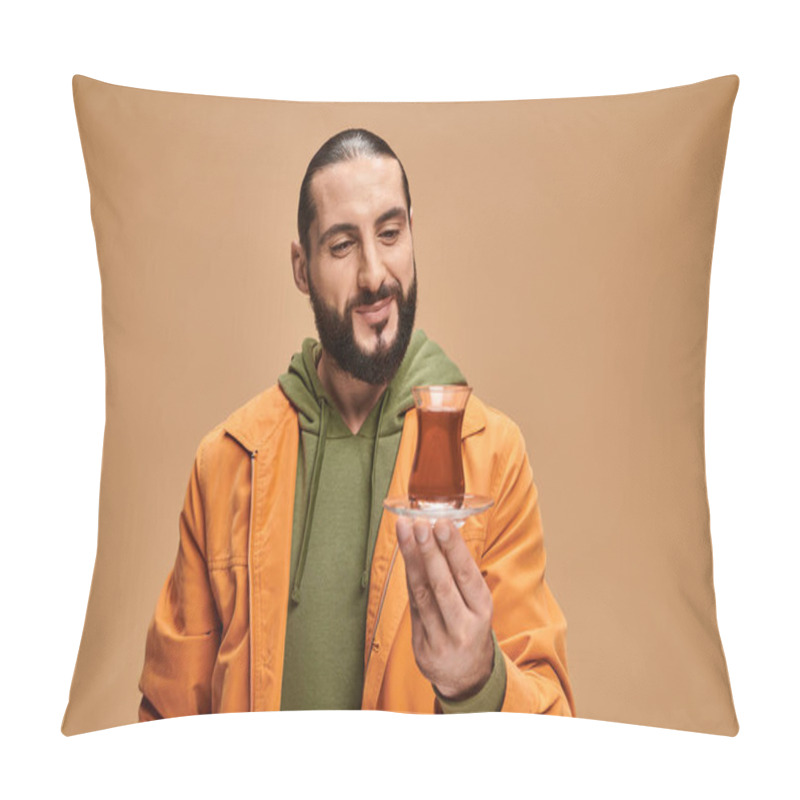 Personality  Happy Bearded Man In Casual Attire Looking At Turkish Tea In Glass Cup On Beige Background Pillow Covers