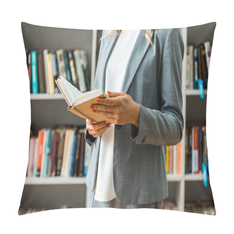 Personality  Cropped View Of Woman Holding Book And Standing In Library  Pillow Covers