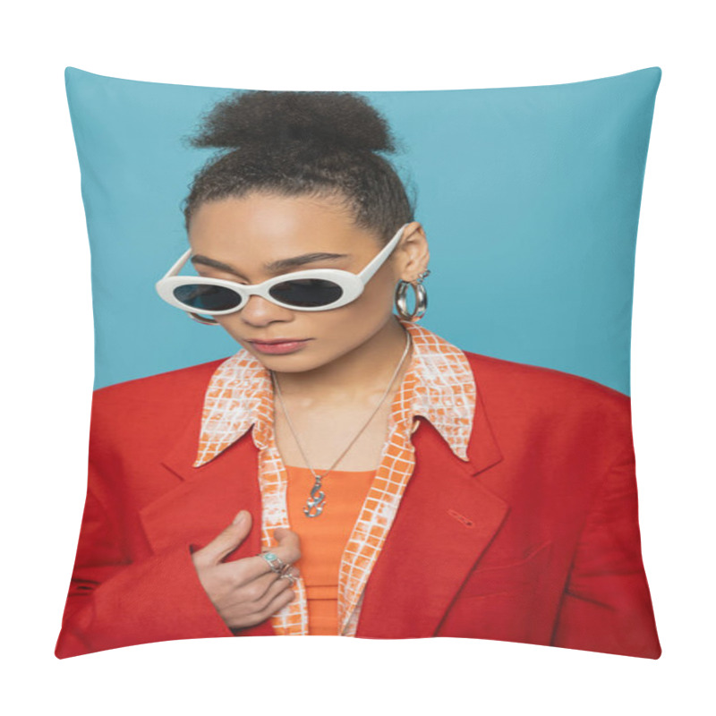 Personality  Portrait Of African American Woman In Hoop Earrings, Sunglasses And Vibrant Outfit Posing On Blue Pillow Covers