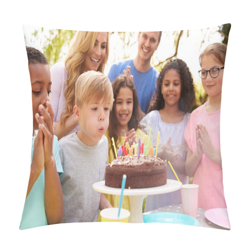 Personality  Boy Blows Out Candles As He Celebrates Birthday With Party For Parents And Friends In Garden At Home Pillow Covers