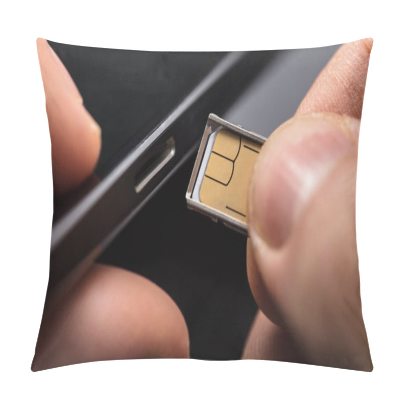 Personality  Close-up Of A Person Inserting A Sim Card Into The Back Of A Mobile Phone Pillow Covers