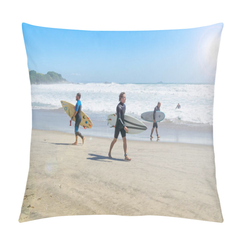 Personality  MOUNT MAUNGANUI NEW ZEALAND - FEBRUARY 10 2019:  Surfers Walk The Main Beach Looking For Best Spot To Enteron A Rough Sea Day. Pillow Covers